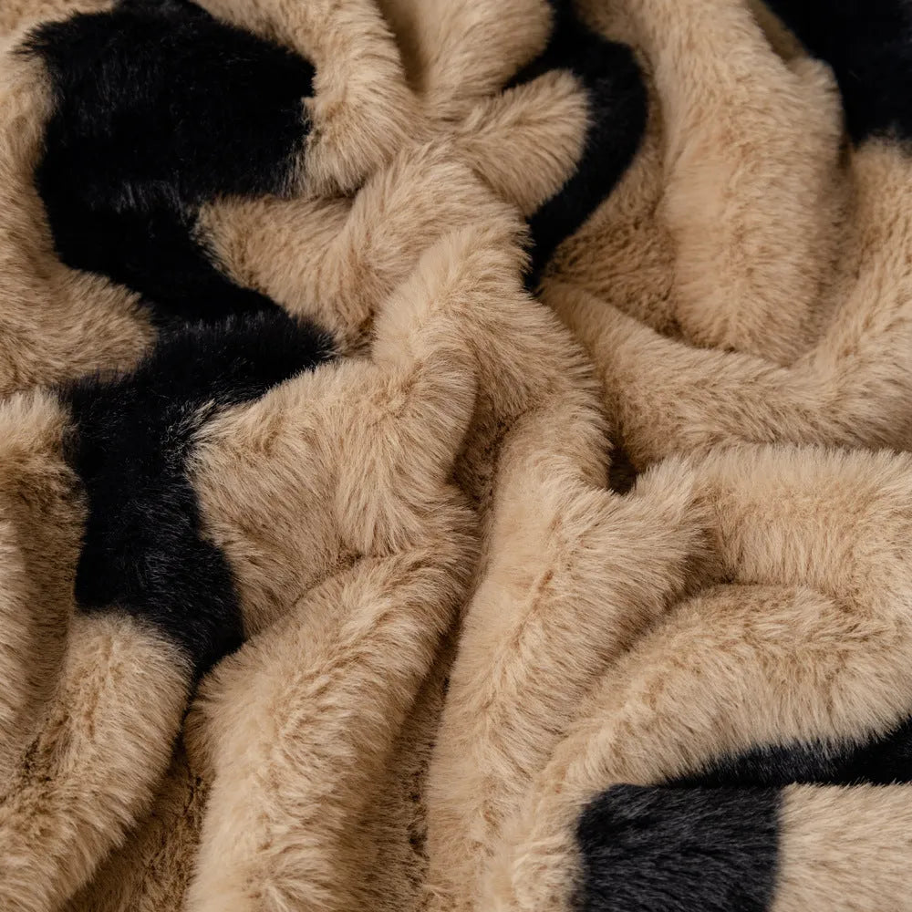 Zebra pattern flannel sofa slipcover in caramel colour showing non-slip underside and matching pillowcase