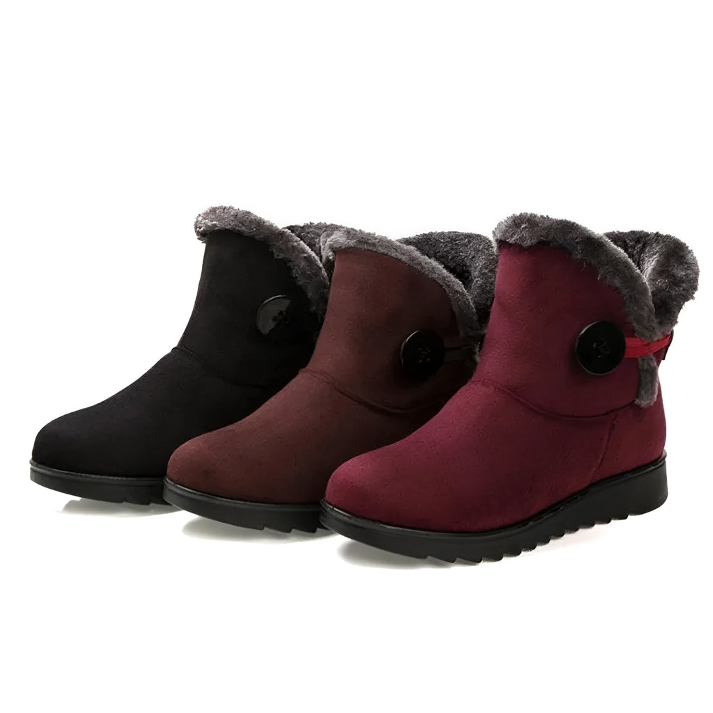 Women's winter flock ankle snow boots with button closure, rubber sole, and low platform in solid colour