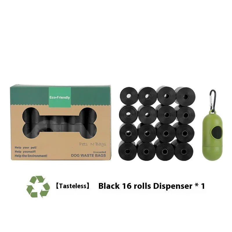 Roll of green EPI degradable dog poo bags next to a white plastic dispenser on a grass background.