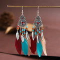 Round drop feather design alloy earrings with leaf pattern in a bohemian style, showing electroplated finish.