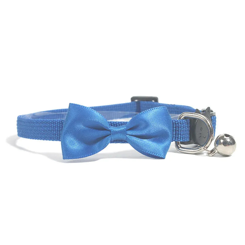 Adjustable striped nylon cat collar with a small bell, shown in multiple colour options on a white background.
