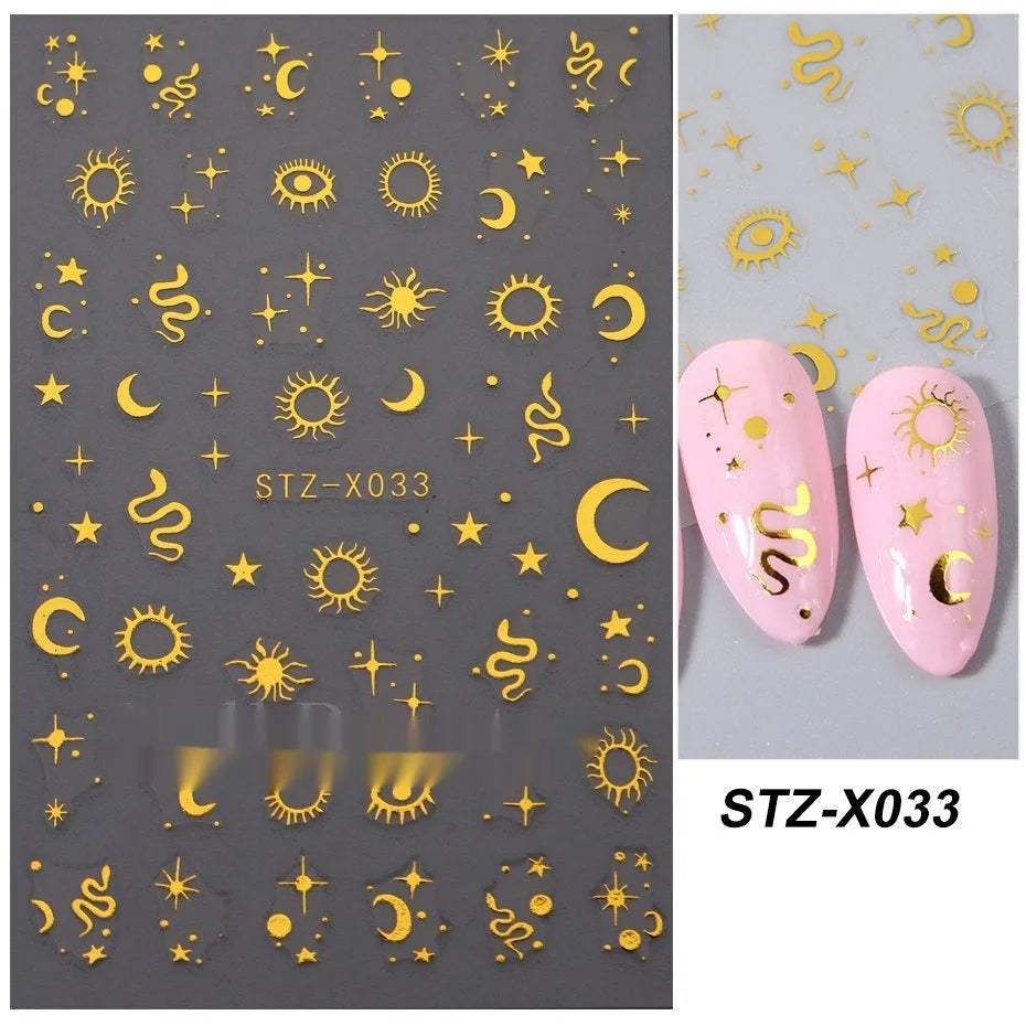Sheet of black and silver strip nail art stickers with cartoon and love heart designs