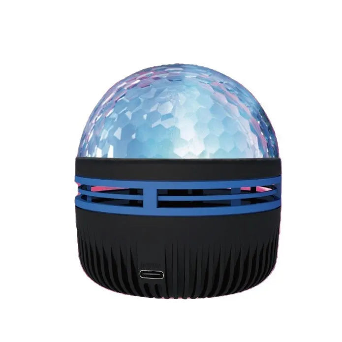 Fantasy Northern Lights projection star light with geometric PVC shade on a shelf