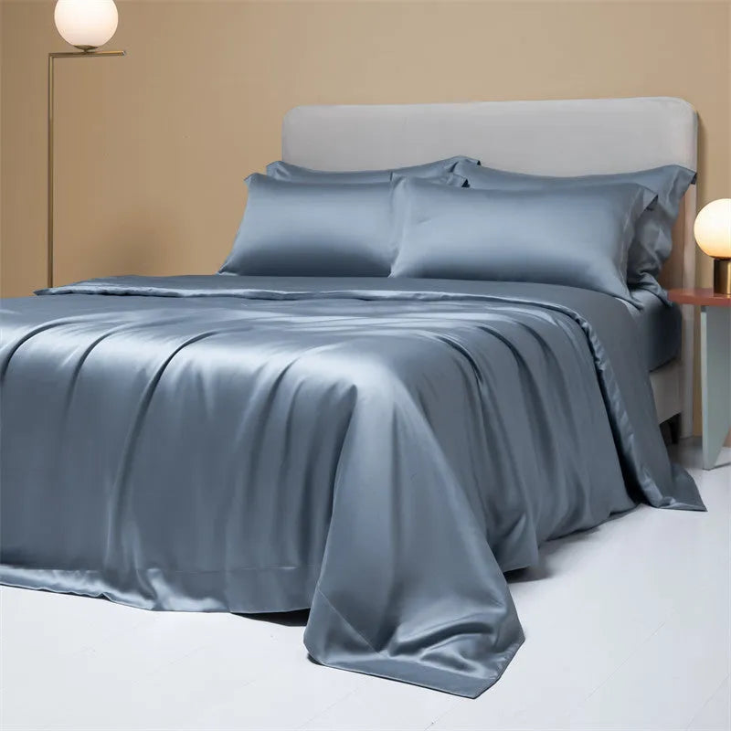 Luxury Lenzing Tencel quilt cover and pillowcase set in a modern style, showing colour options like Aurora Blue.