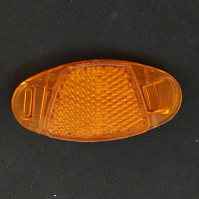White and yellow plastic bicycle wheel spoke reflectors showing dimensions