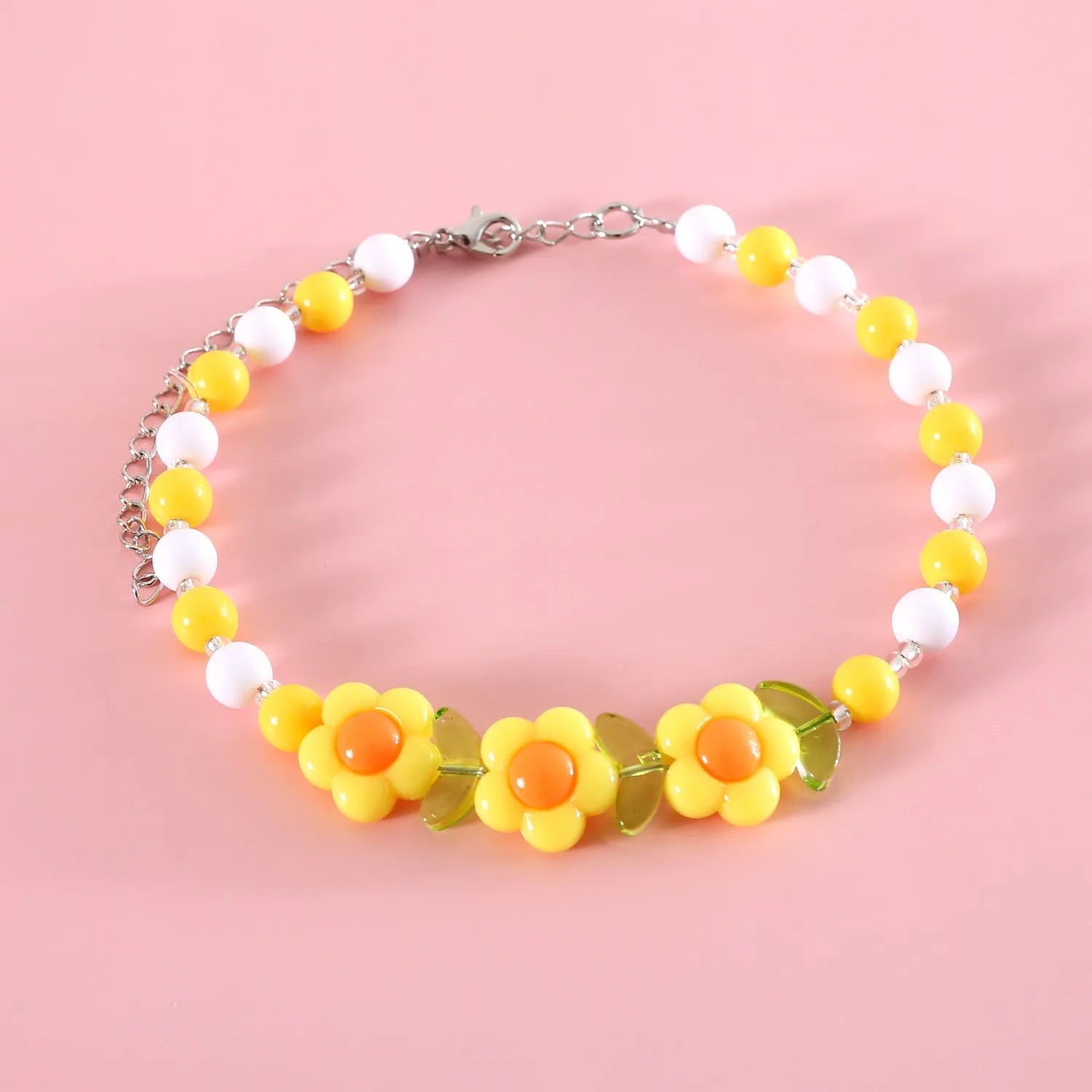 Colourful plastic bead necklace for small pets in rainbow, peach, or small flower patterns with adjustable sizing