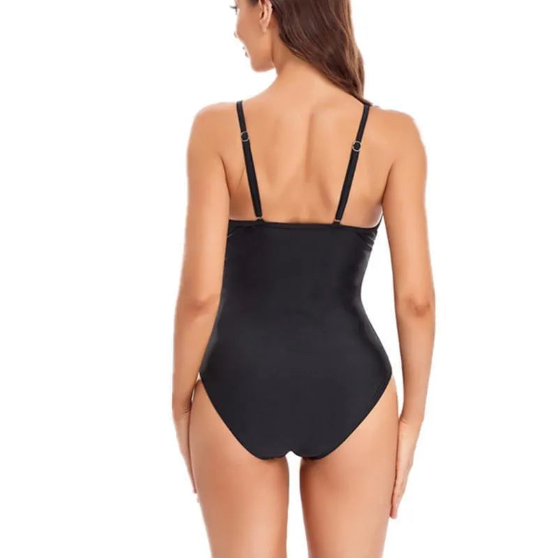 Ladies' solid black backless one-piece swimsuit made from polyester and spandex fabric