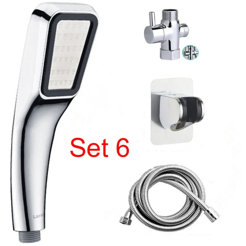 Orange hand-held rain shower set with wall bracket and connection hose