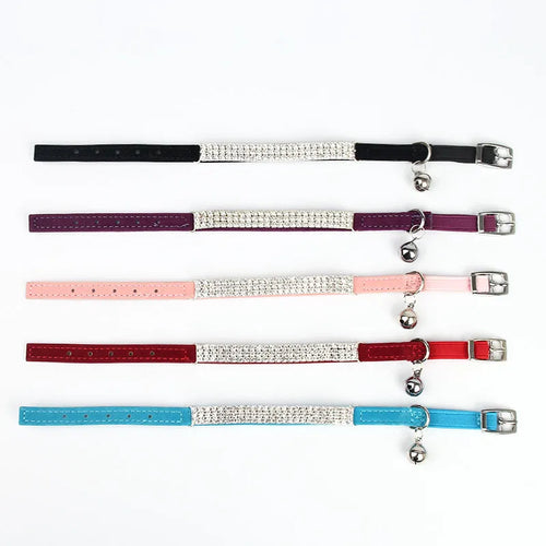 Rhinestone-studded velvet cat collar in assorted colours on a white background