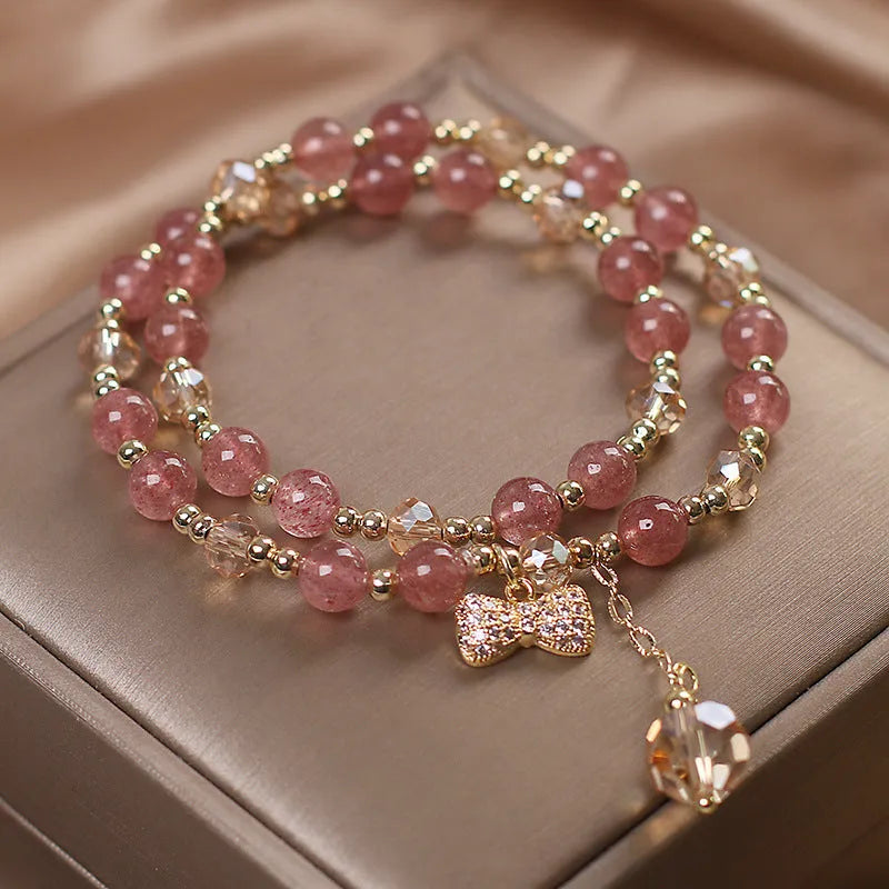 Double layer strawberry quartz bracelet with lucky cat charm and red cat's eye flowers