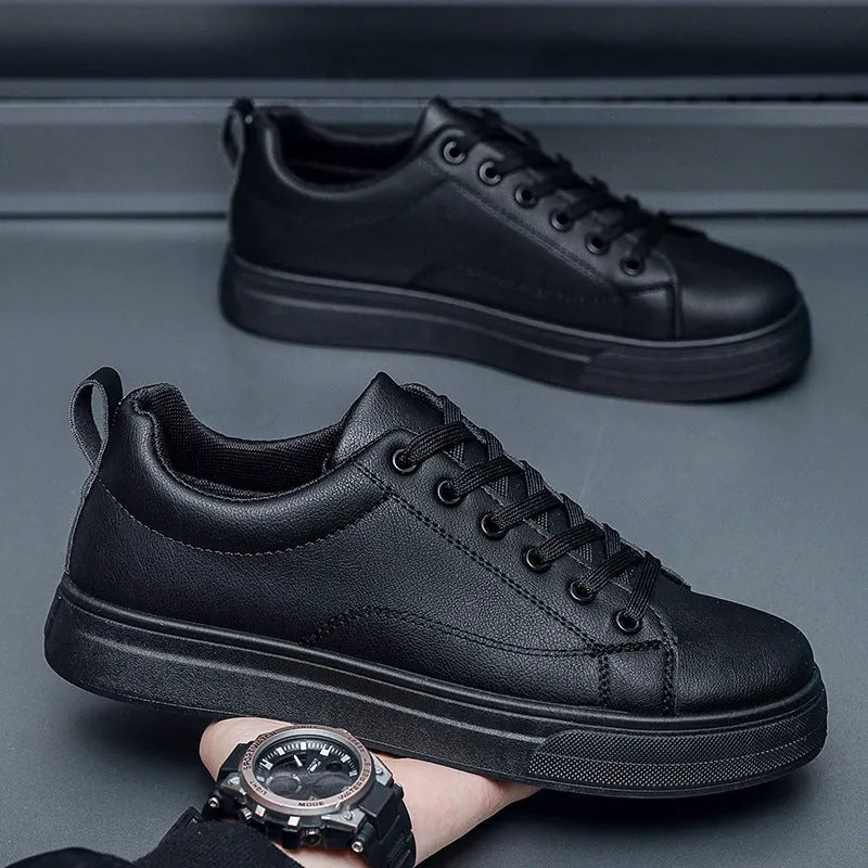 Men's low-top Korean-style sneakers in black, white, and black with white sole colour options.