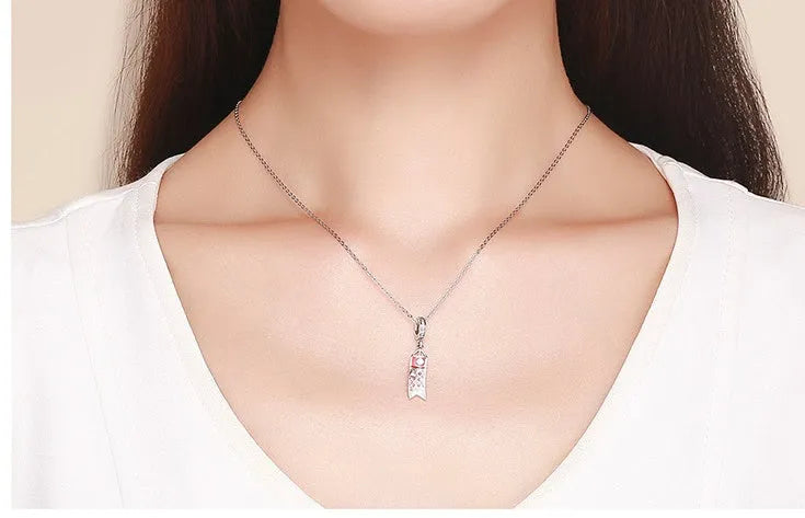 S925 sterling silver carp streamer jewellery charm with zircon stones and oil drop oxidation finish.