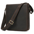 Men's dark brown Crazy Horse leather crossbody bag with visible stitching, shown holding A4 documents.