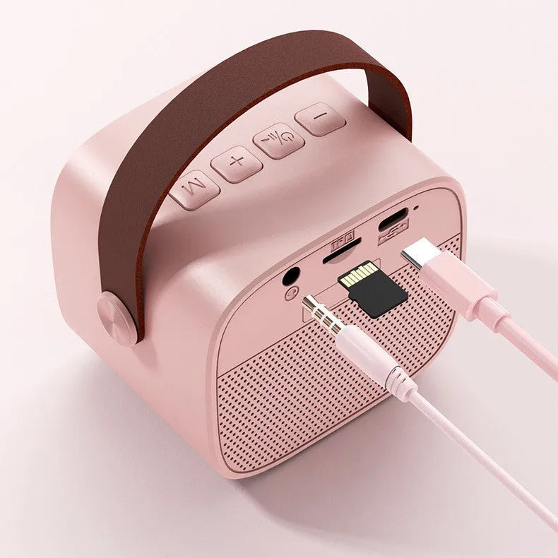 White portable Bluetooth speaker with wireless audio and microphone for hands-free calls.