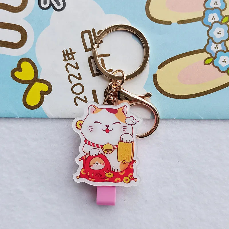 Cartoon lucky cat design plastic certificate sleeve and matching ferrule pendant set.