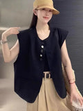 Women's loose fit polyester vest in milky white, featuring a short length and a front pocket.