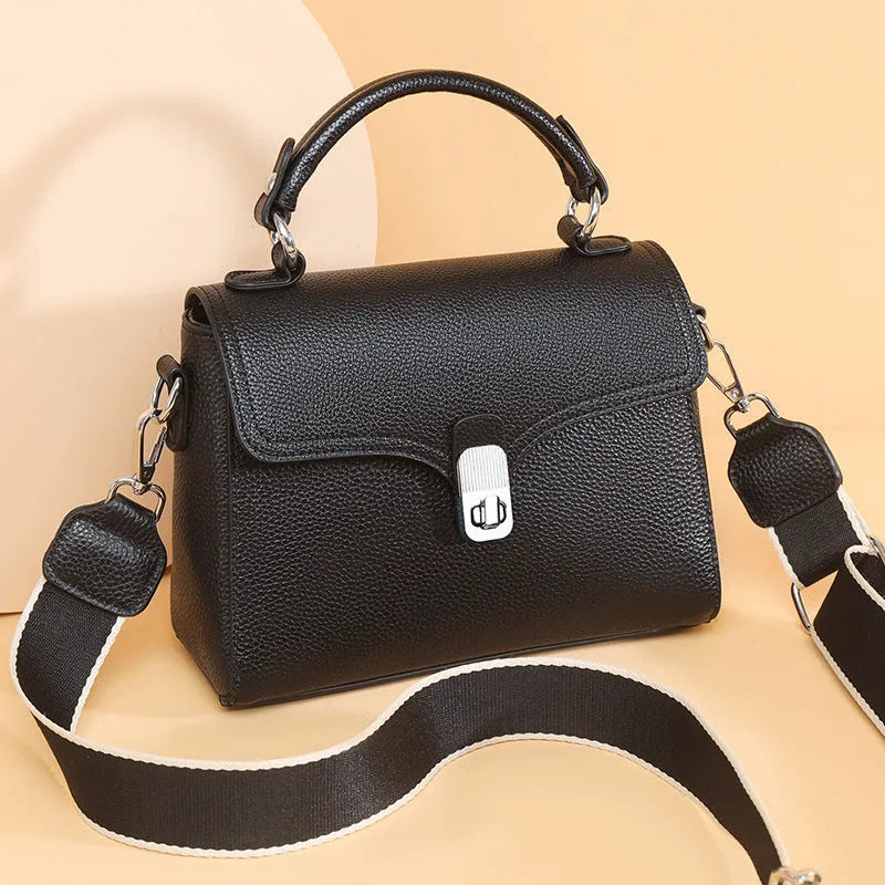 Korean commuter women's portable cross-body bag genuine leather oval shape in black with sandwich pocket