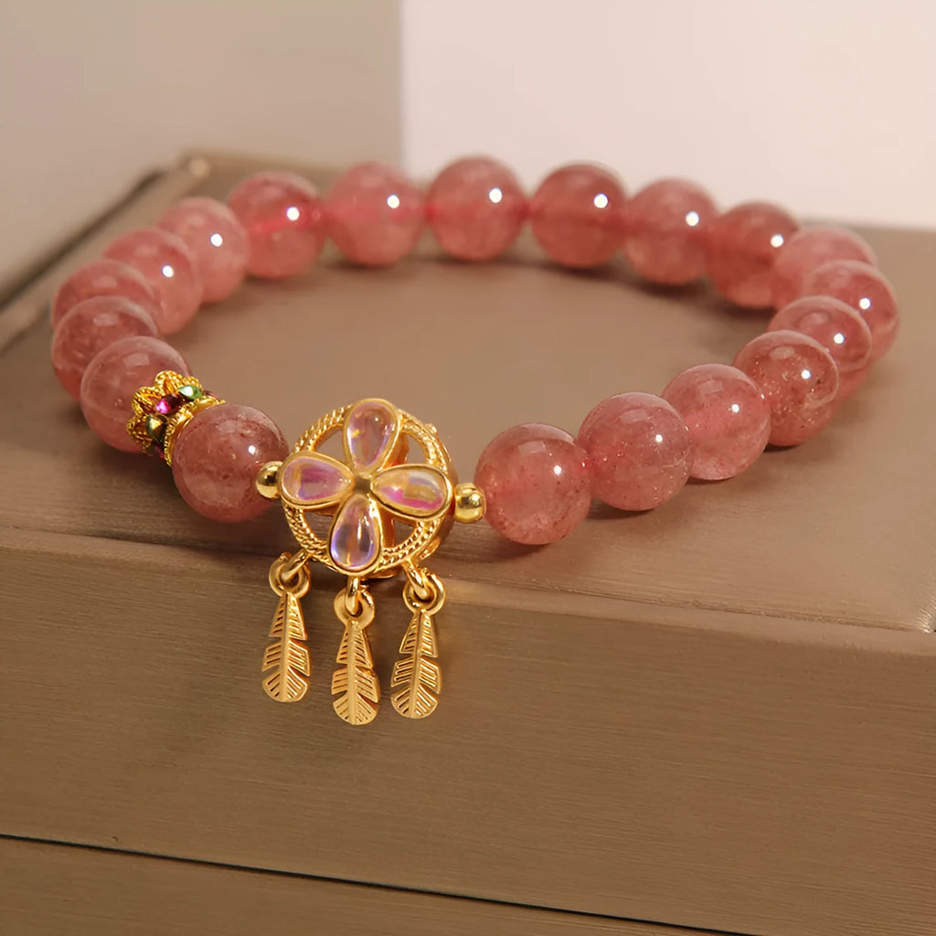 Women's strawberry quartz bracelet with four-leaf clover dream catcher pendant