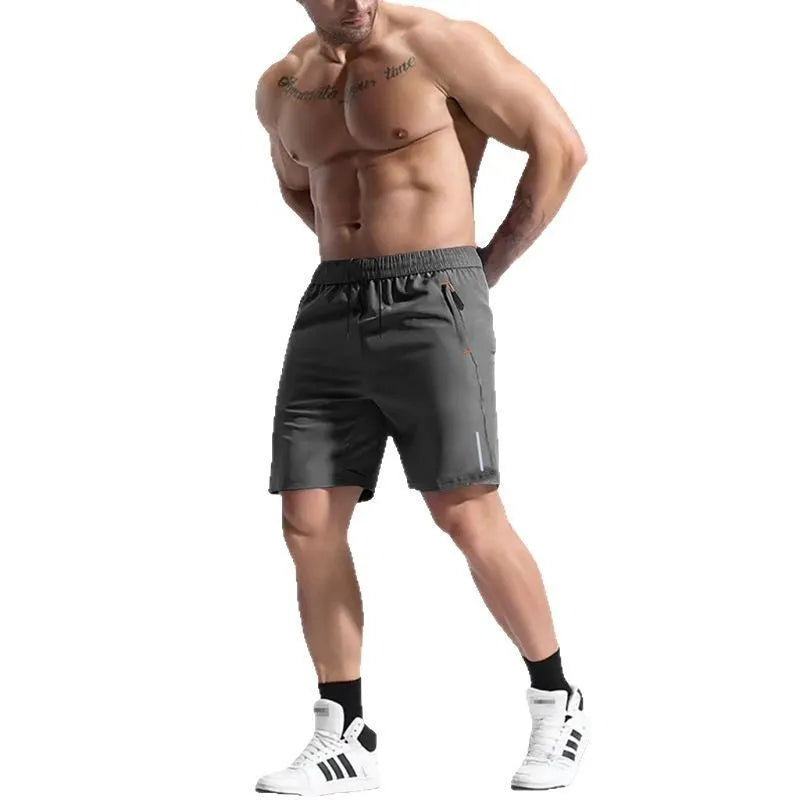 Men's bamboo fibre sports shorts in army green with an elastic high waist and drawstring closure.
