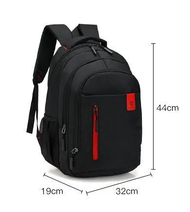 Blue lightweight Oxford fabric backpack for teenagers with side zip pockets and padded straps.