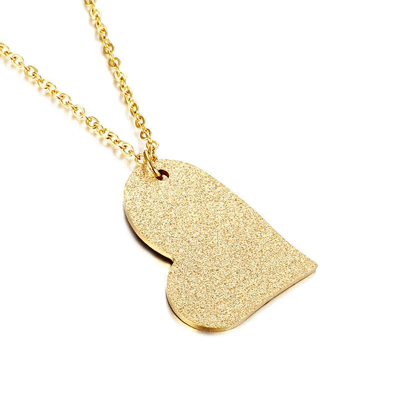 Geometric heart-shaped titanium steel pendant necklace on a model, colour KN25736-Z.