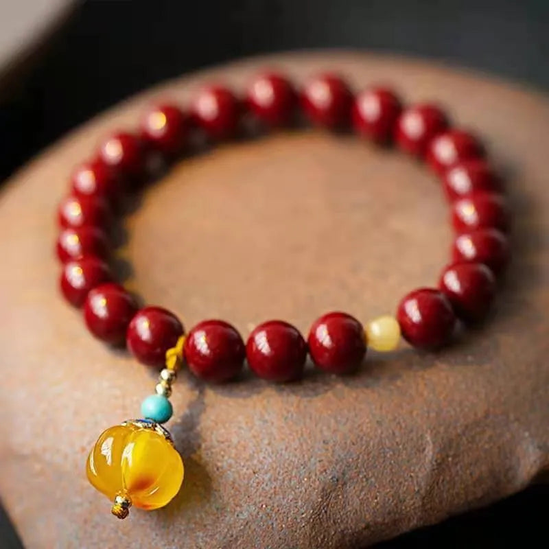 Handmade wave-shaped cinnabar and copper bracelet in national style design