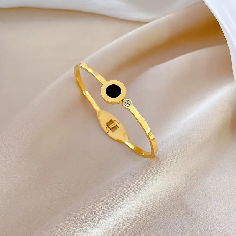 Roman titanium steel bracelet in gold electroplated finish, retro design