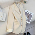 Women's Korean style loose fit coat in milky white colour with pockets and long sleeves