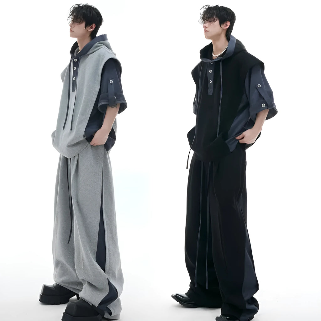 Men's black heavy industry style hooded jacket with three-dimensional stitching and matching grey joggers.