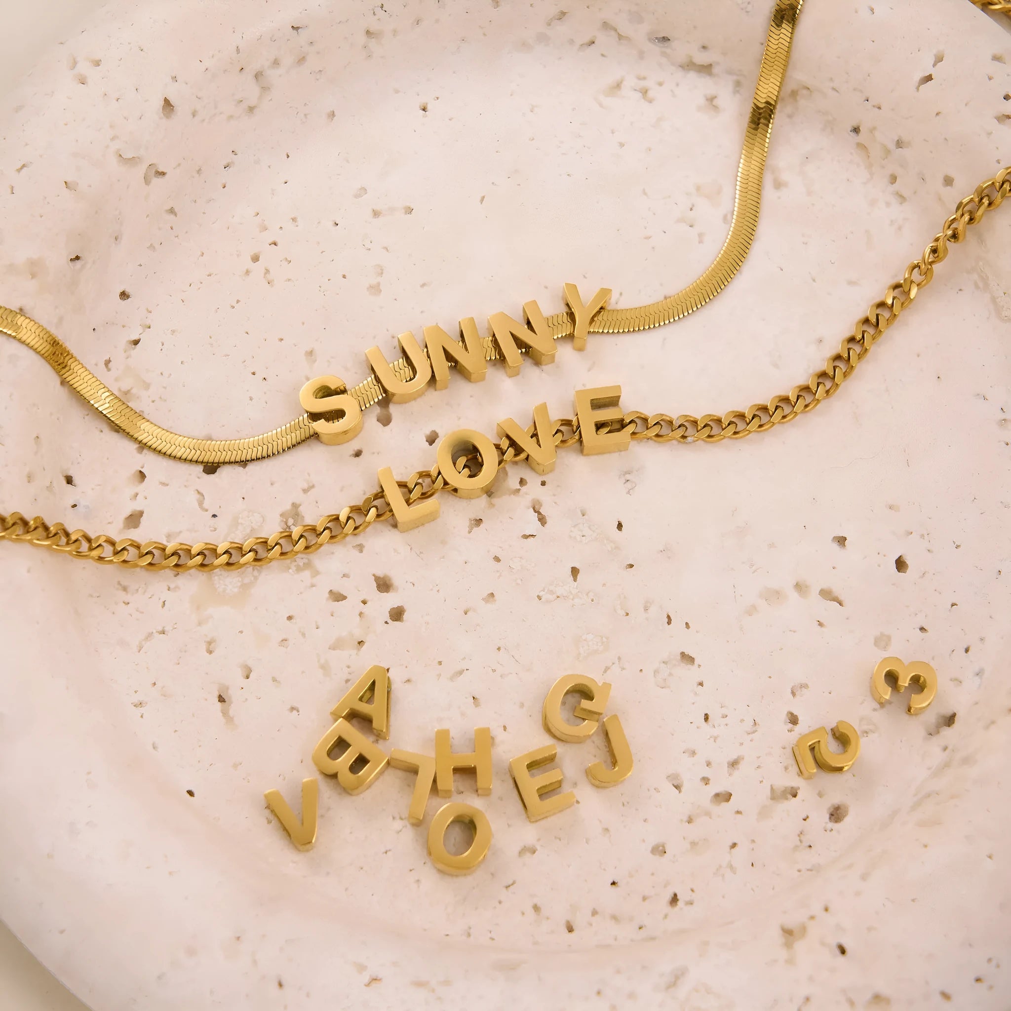 Gold electroplated titanium steel necklace with the letter 'A' pendant on a 40.5cm chain.