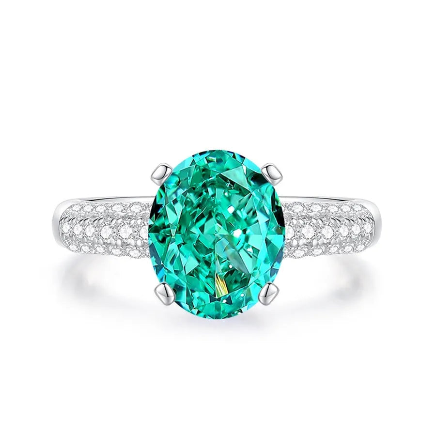 S925 sterling silver ring for women with a green emerald stone set using Palaibahao inlay and diamond accents.