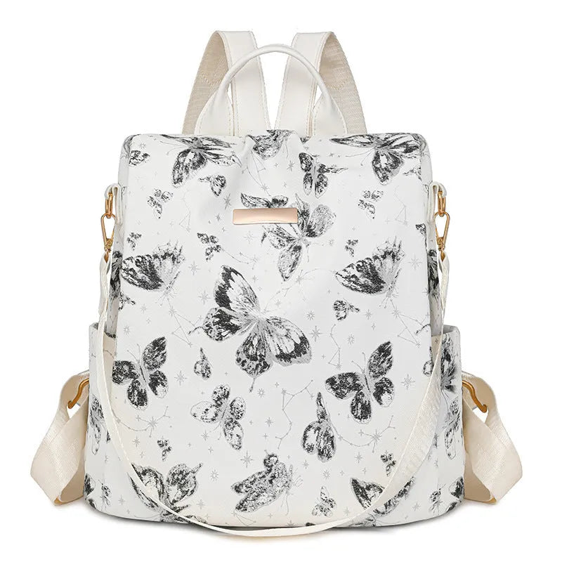 Butterfly printed large capacity backpack in multiple colours with sewing line detail