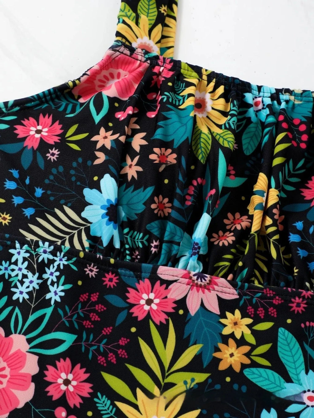 Women's floral print one-piece swimsuit with full-bed design and polyester construction