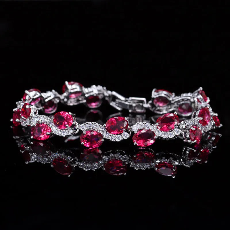 Electroplated copper bracelet with zircon stones in geometric design showing gold colour finish