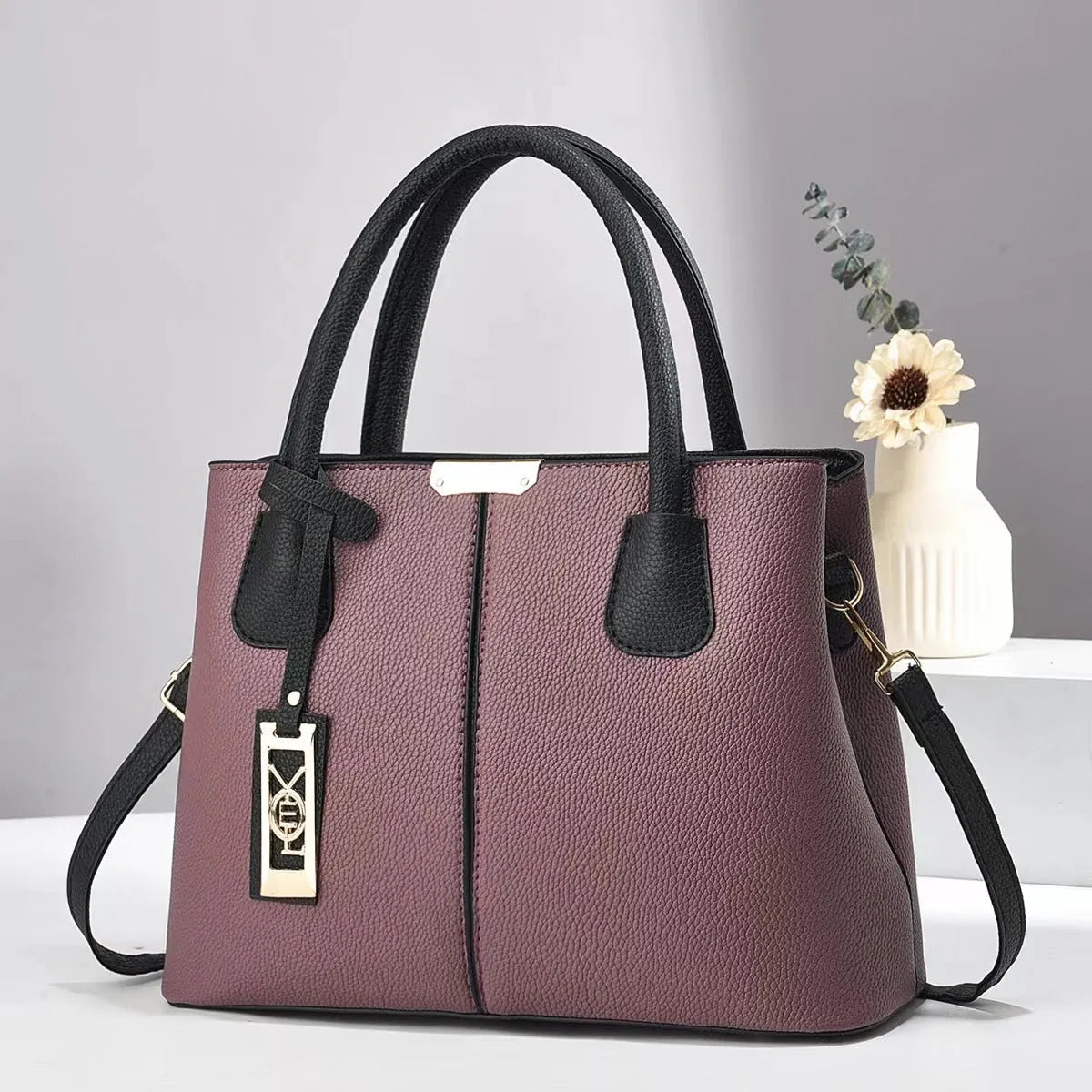 Soft PU fashion handbag with leather shoulder strap in horizontal square shape