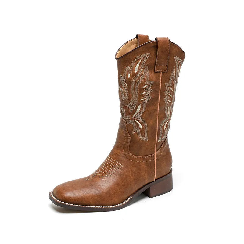 Brown women's mid-calf Martin boots with embroidered detail, round toe, and low square heel.