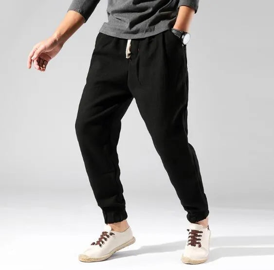 Irukite men's high waist loose winter trousers in black with belt and zip fly, plus velvet lined