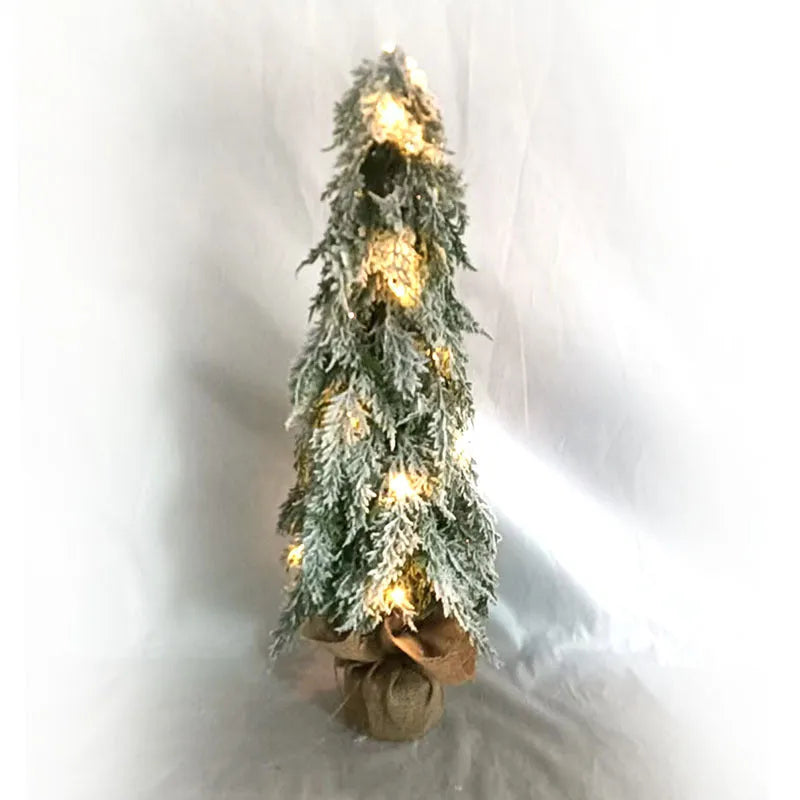 Small 24-inch white Christmas tree with lights and snow-covered branches for desktop decoration