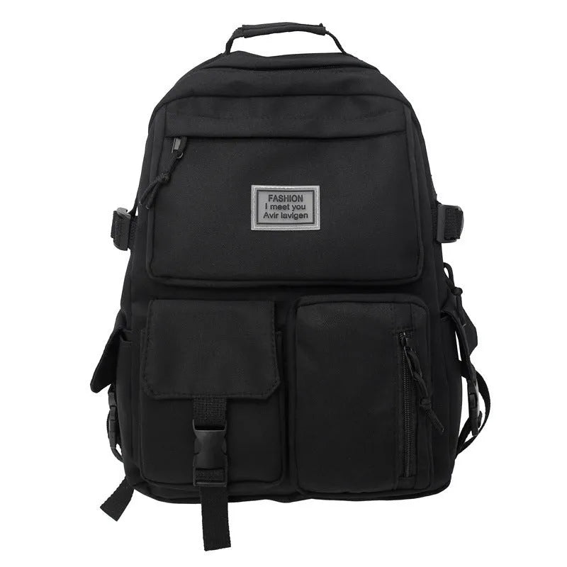 Black nylon student backpack showing laptop compartment and three-dimensional pockets