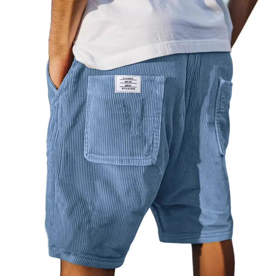 Men's grey straight-leg corduroy shorts with multiple pockets and embroidery detail on a hanger.