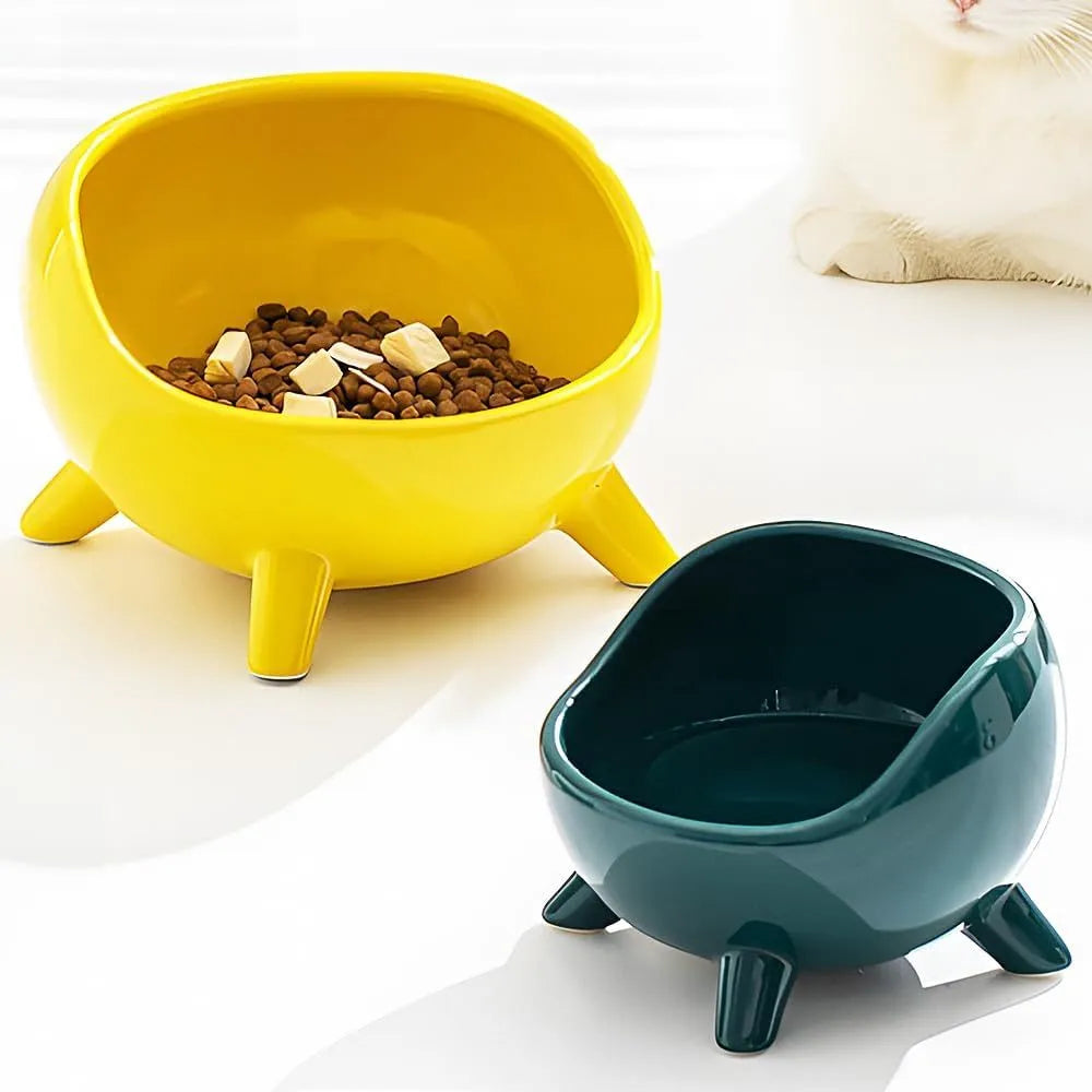 Green four-legged ceramic cat food bowl for indoor pets with wide mouth design