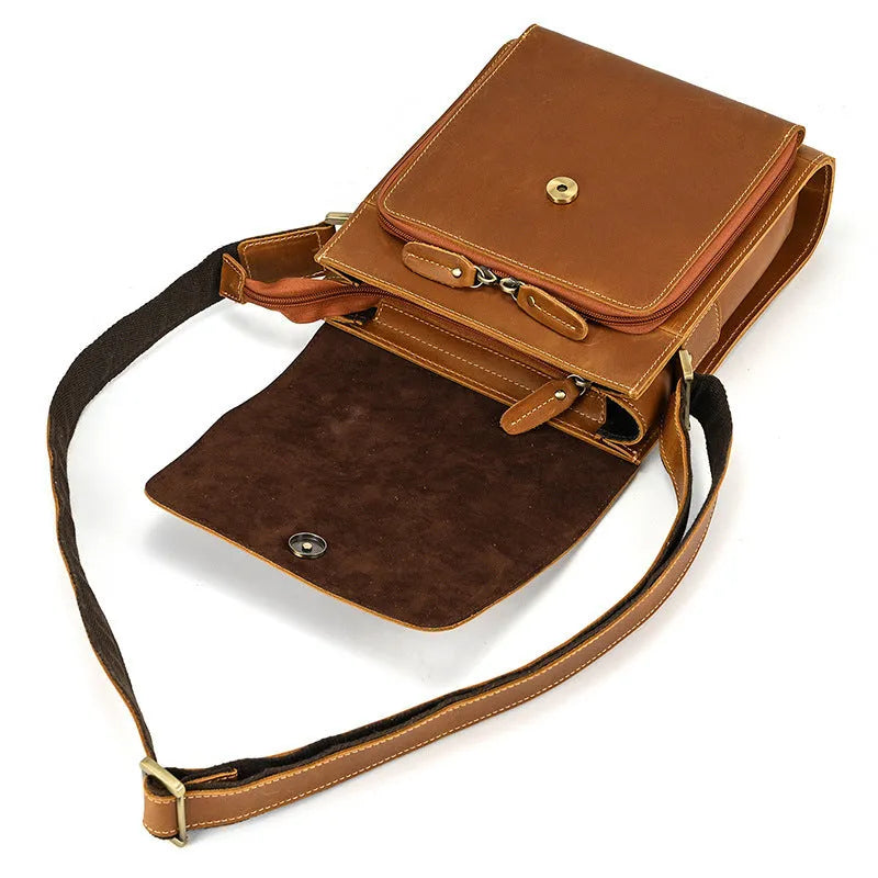 Men's dark brown Crazy Horse leather crossbody bag with visible stitching, shown holding A4 documents.