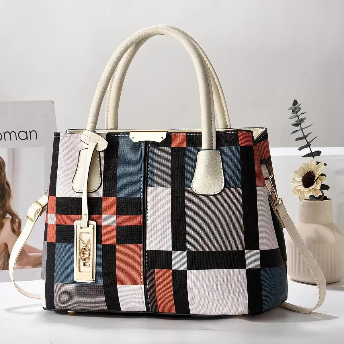 Soft PU fashion handbag with leather shoulder strap in horizontal square shape