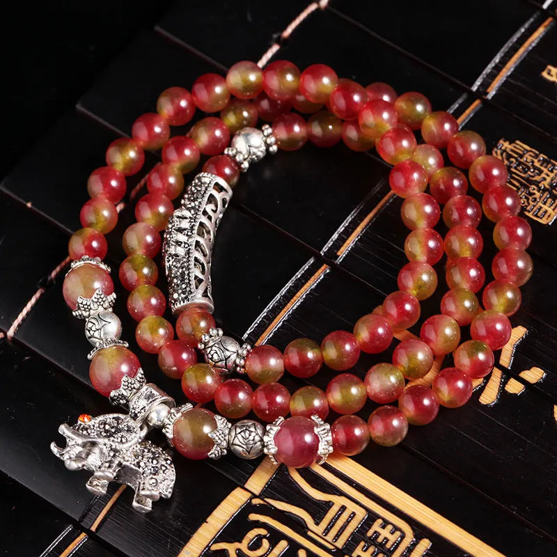 Handmade watermelon crystal bracelet with Chinese knot closure in elephant style design