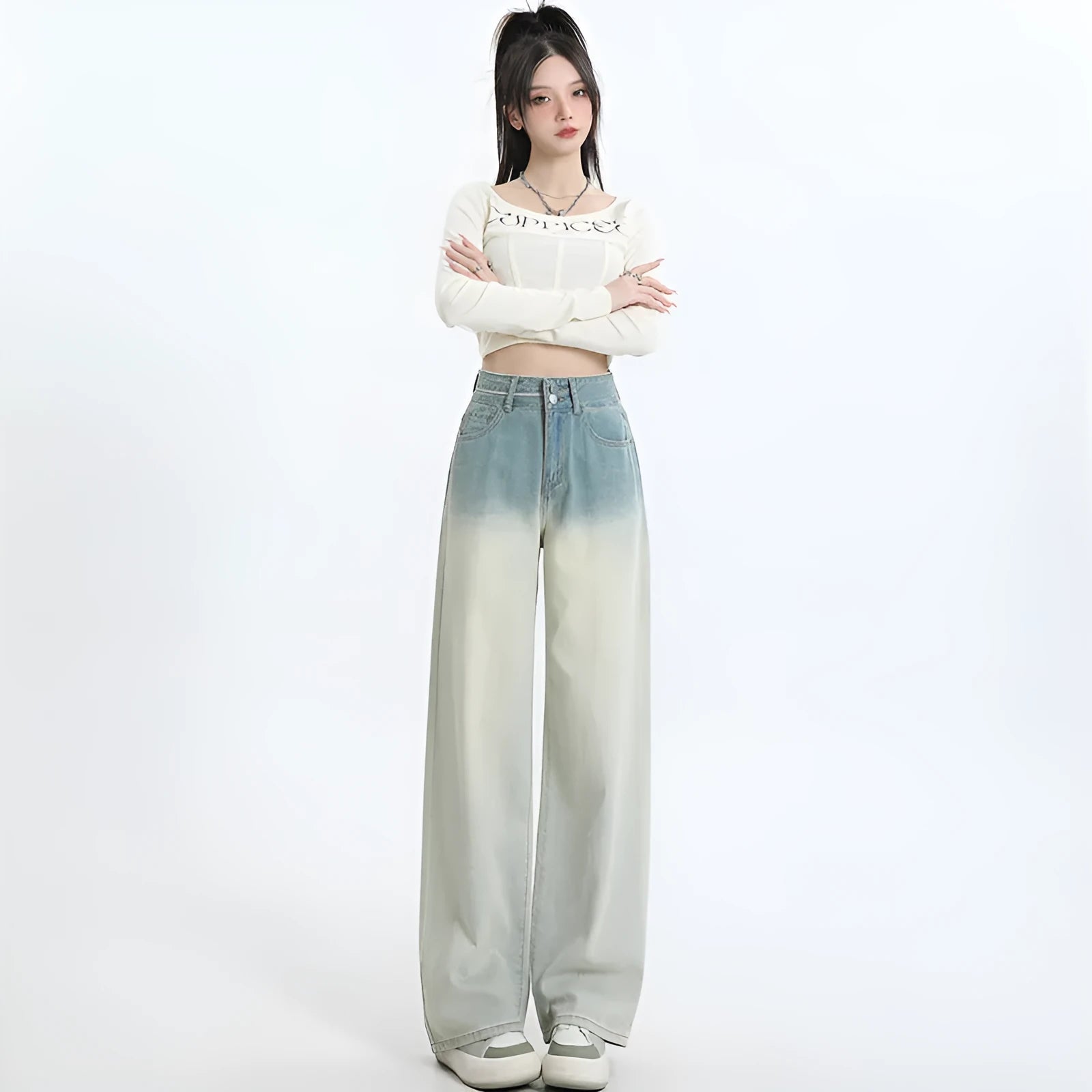 Women's gradient blue straight-leg denim trousers with wide leg silhouette on hanger