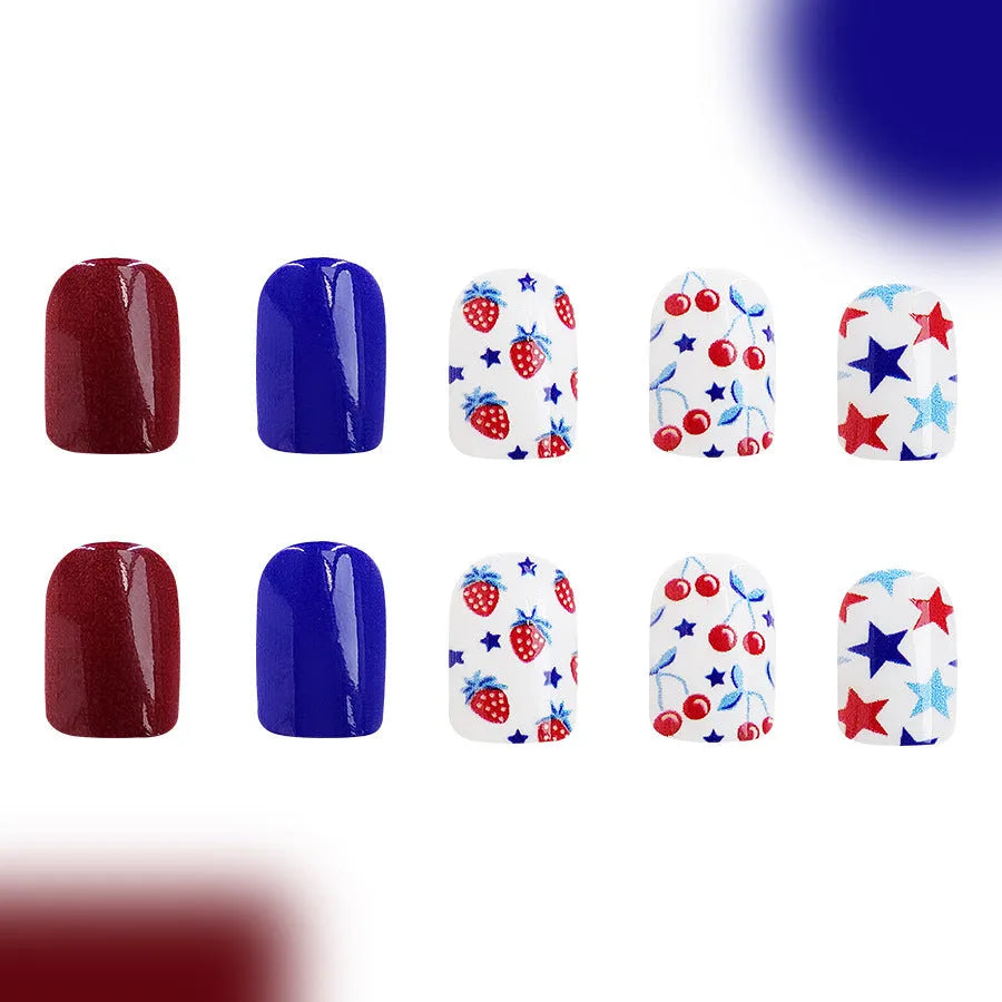 Short glossy red and blue nail stickers with strawberry and cherry patterns for Independence Day