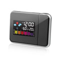 Black digital projection alarm clock with thermometer and hygrometer on bedside table