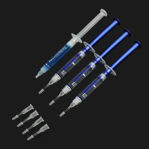 Advance Teeth Whitening LED Kit with white mouth trays and blue LED light unit