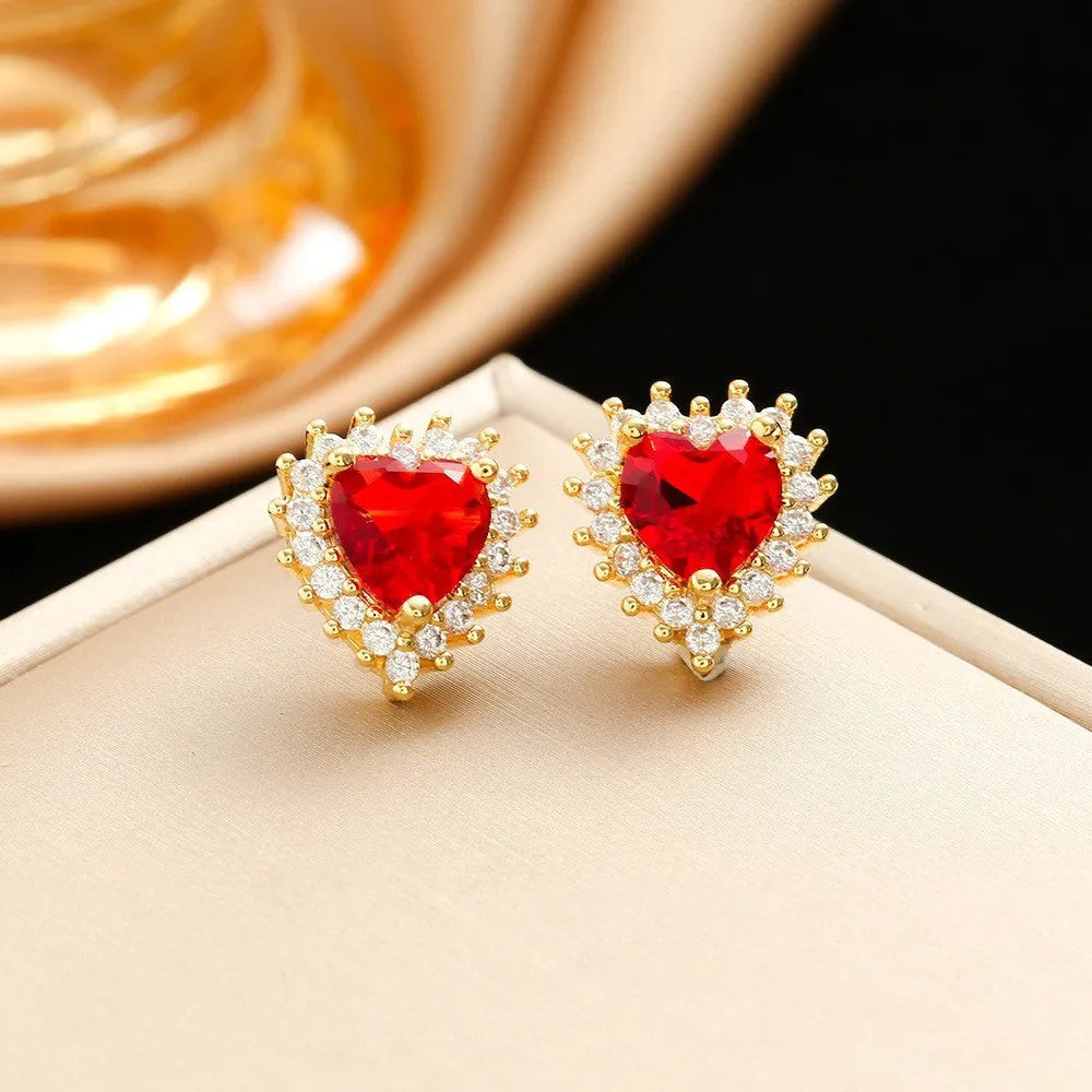 Gold-red titanium steel jewellery set with heart flower pendant necklace, stud earrings, and ring.