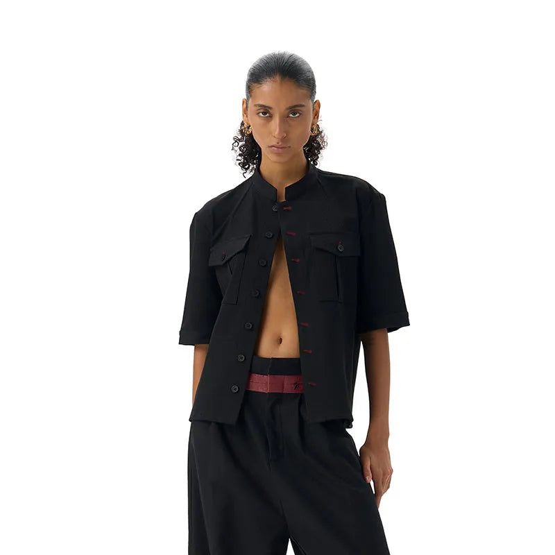 Black loose fit hunting shirt with half sleeves, shirt collar, and single-breasted placket